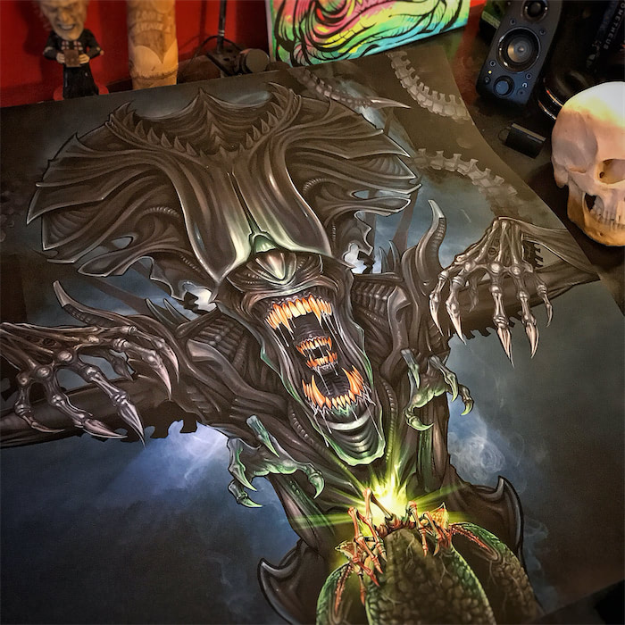 Photo of backglass pinball illustration of the Queen from the movie Aliens